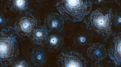 A field of many small blue spiral galaxies rendered in fine dotted lines on a black background.