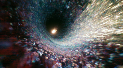 Looking down a vast blurred tunnel of speckled iridescent data — blues, crimson, and pale flecks like distant faces — toward a single brilliant white-gold spark igniting at the center of a dark void.
