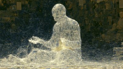 A crystalline, glass-grid figure sits in meditation, washed in amber, before a vast dark wall densely textured with books, papers, and half-seen human faces, a soft golden glow at its lap.
