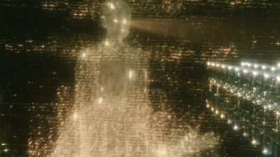A glowing spiral vortex of golden rings and text opens in a dark library, a small silhouetted figure standing before it.